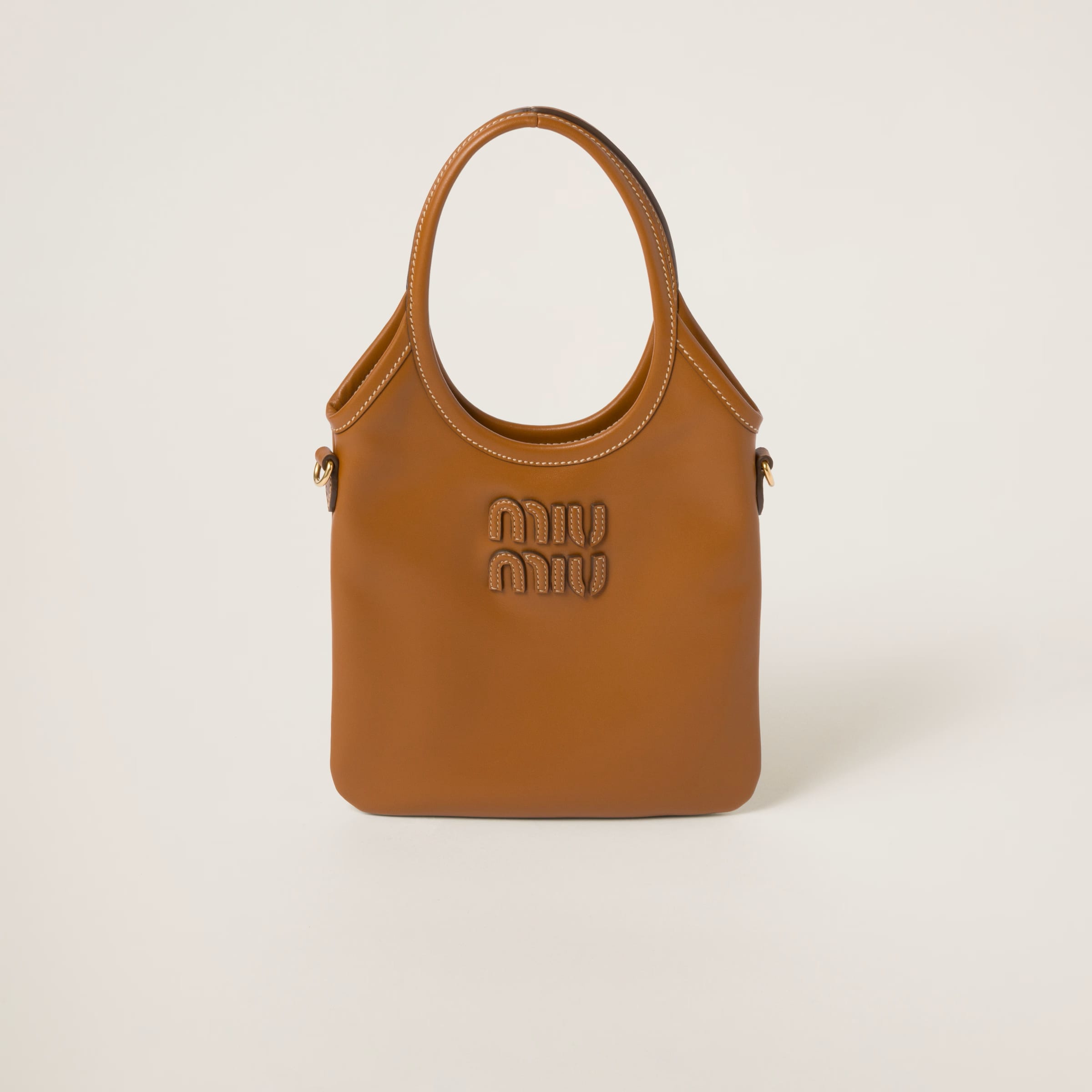 IVY leather handbag - Cognac, SGD 2550 (P112,640.36), MIU MIU, miumiu.com